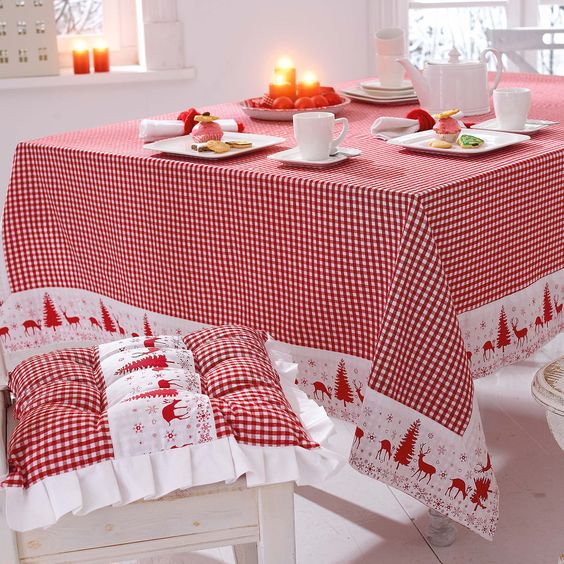Scandinavian red and wwhite tablecloth and chair cushions
