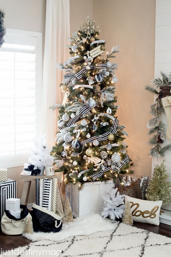 chic black and white Christmas tree decor with silver touches for a sparkle