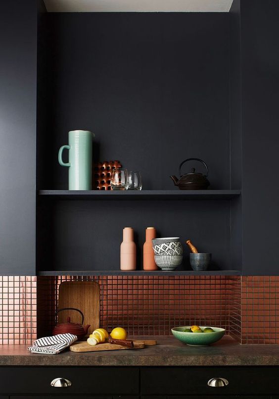 matte black kitchen with a tiny copper tile backsplash looks minimalist and very chic
