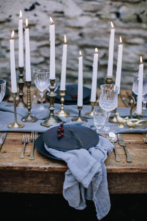 moody winter tablescape in grey and black, gilded candle holder add a refined touch