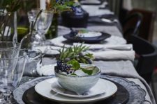 09 keep the table in moody shades like grey, navy and black