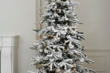 10 Alaskan fir tree with silver ornaments looks very modern and chic