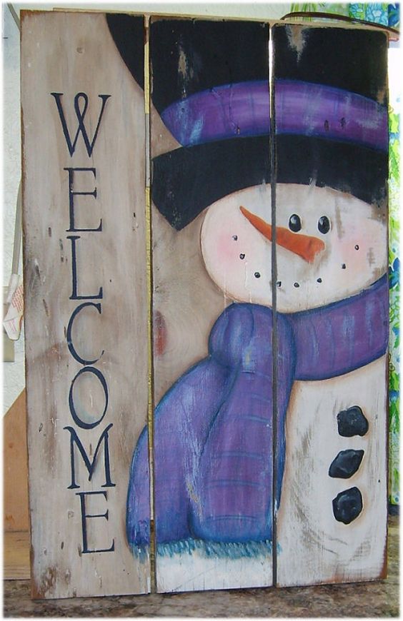 handpainted snowman sign on reclaimed wood