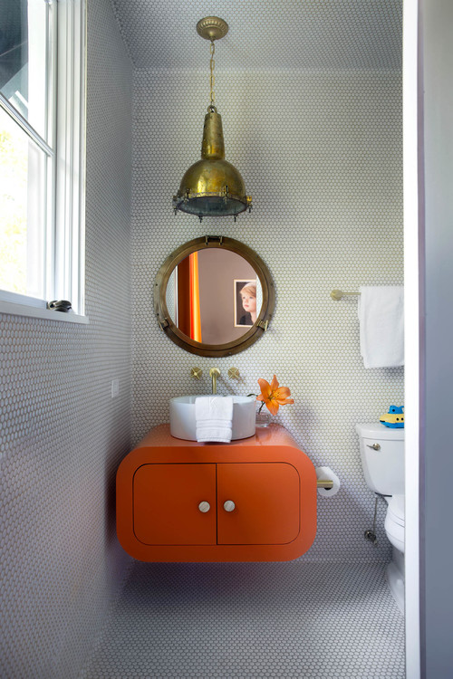 There's also a separate kids' bathroom with bold furniture