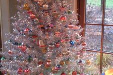 11 a vintage tree with multiple colorful ornaments