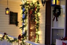 11 evergreen garlands with lights and red bows