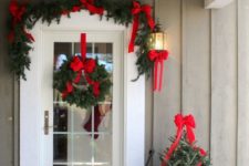 12 easy and elegant decor with evergreens and red bows, some lights included