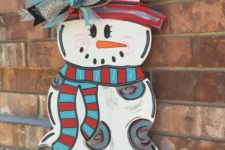 12 painted snowman door hanger