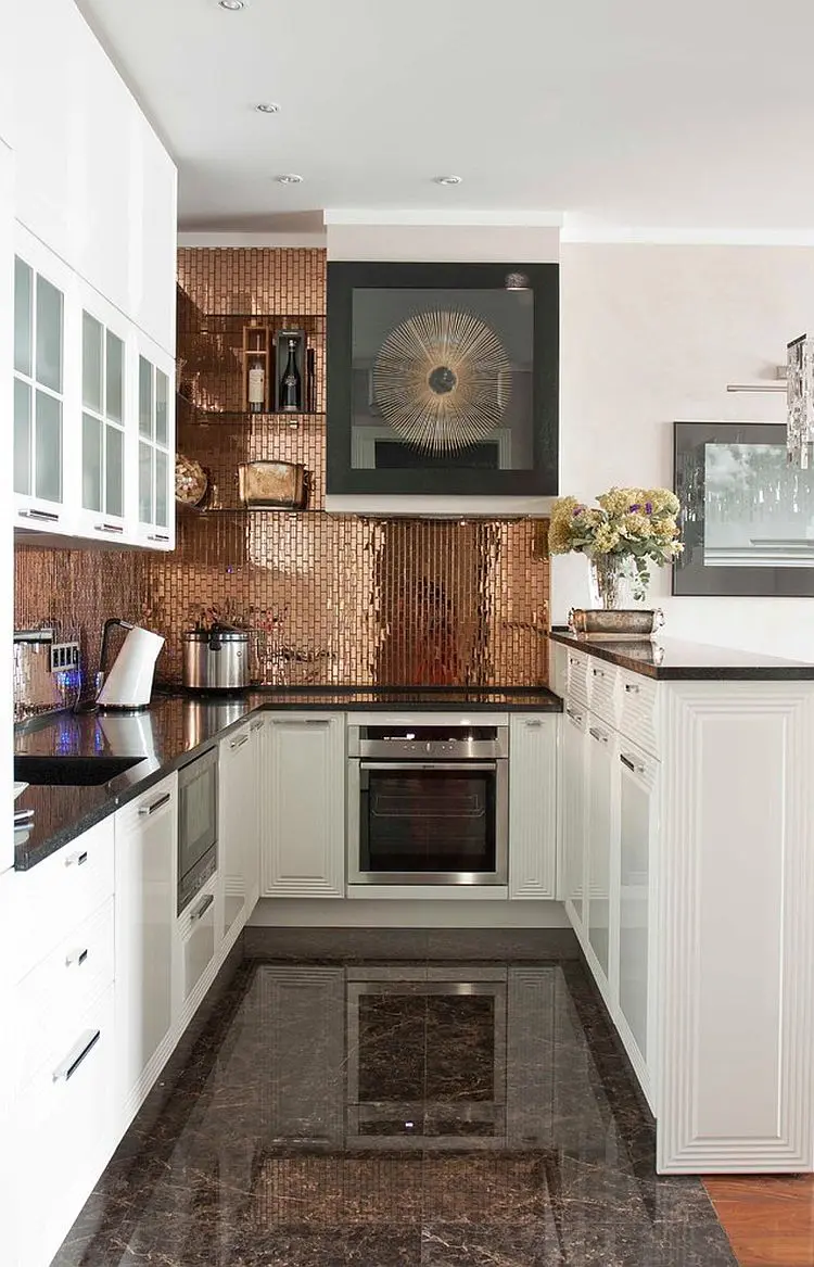 tiny copper tiles, marble floors and white cabinets