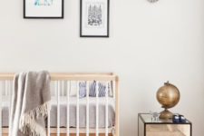 13 A small nursery is decorated in neutrals, with light woods and metallic touches