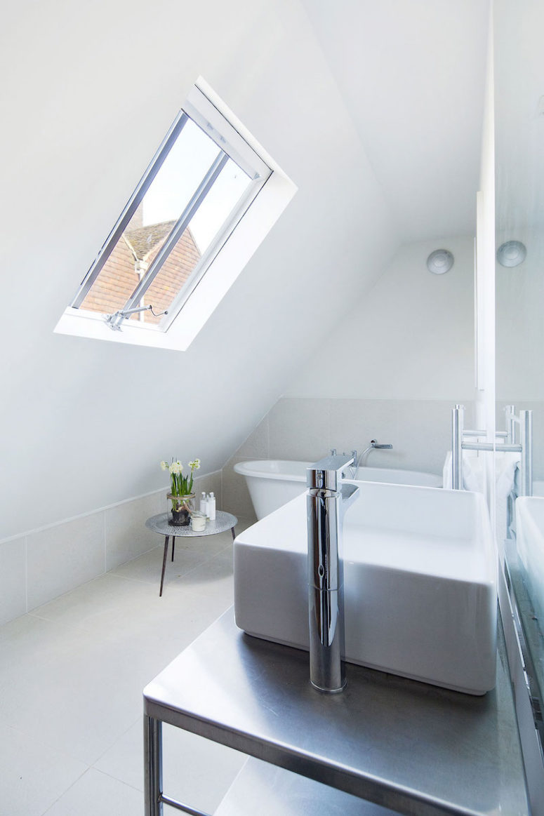 The bathroom is a nice example of how a small attic bathroom can be designed maximizing functionality