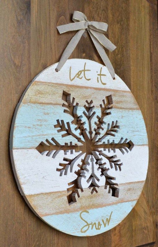 Let It Snow door hanger with a snowflake cut out in it