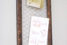 14 framed chicken wire is a great piece to hang photos and cards