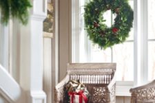 14 lush evergreen wreaths and garlands are a timeless option that fits any interior