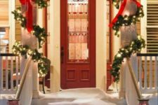 15 light garlands wrapping the pillars and red bows