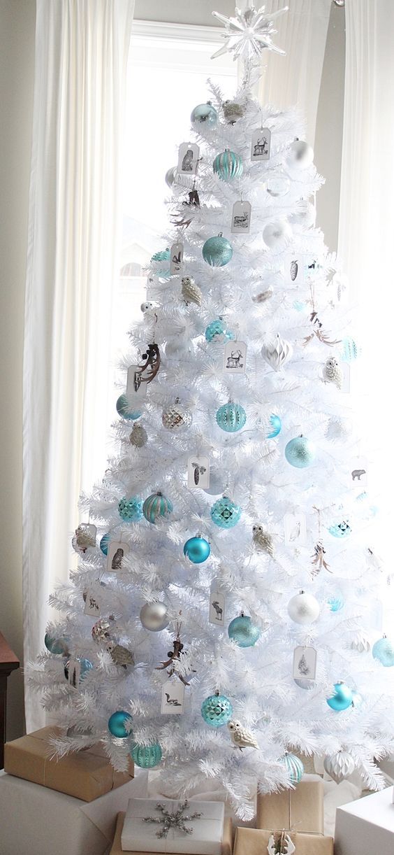 white Christmas tree with turquoise and silver ornaments