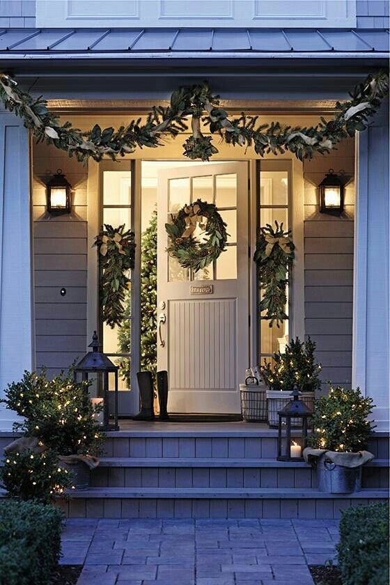 natural evergreen garlands, wreaths and trees with lights