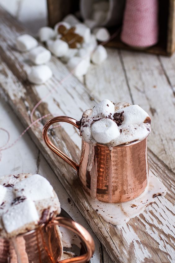 copper mugs with hot chocolate and marshmallows