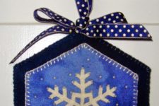 18 stitched wool door hanger with a snowflake