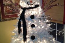 21 lit up silver Christmas tree turned into a snowman for a kids’ room