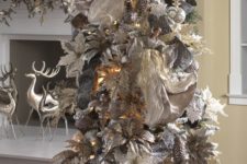 21 unique silver and white Christmas tree made of ornaments and decorations