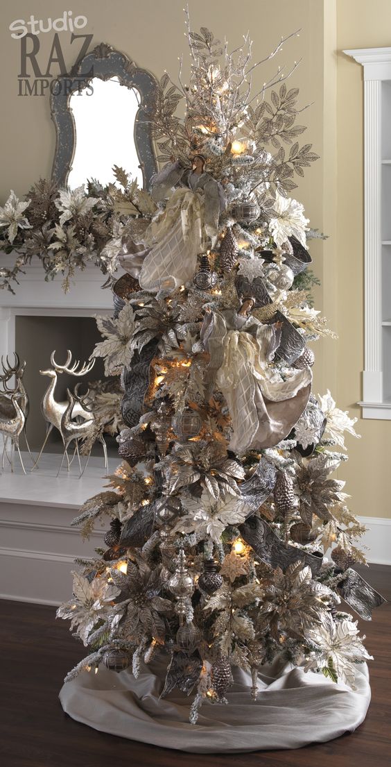 21 unique silver and white Christmas tree made of ornaments and decorations
