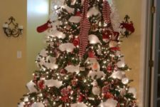 22 top your Christmas tree with a snowman head