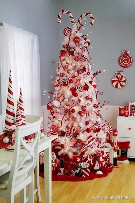 whimsy wwhite tree with red and white decorations and ornaments