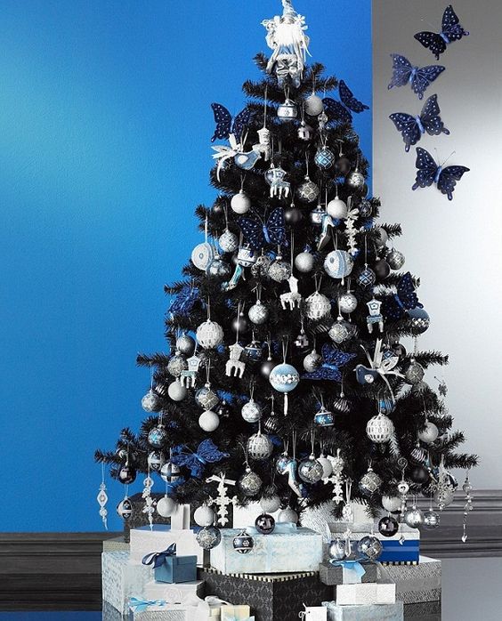 navy, white and silver ornaments look good on black trees