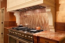 23 small modern kitchen with custom copper backsplash that also adds pattern