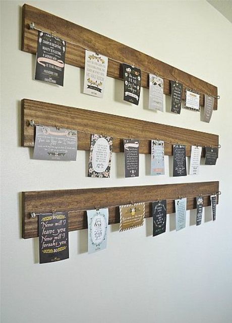 wooden planks with wire and cards attached to them