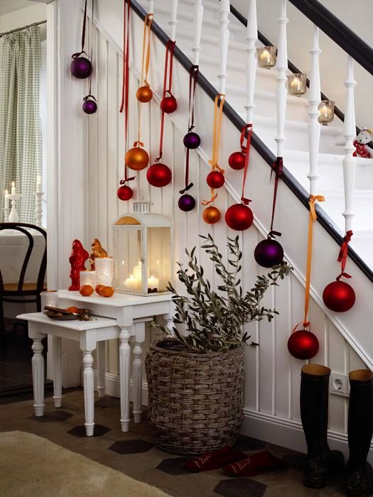large colorful ornaments hanging from the staircase