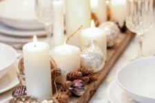 24 place a wooden plank on the table, cover it with pinecones and candles