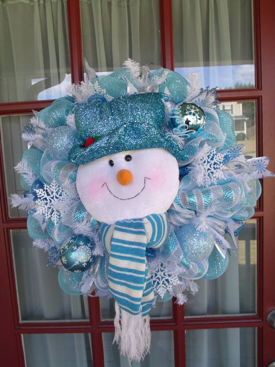 turquouse, glitter and white deco mesh wreath with a snowman