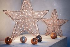 25 copper lit up stars and ornaments for decor