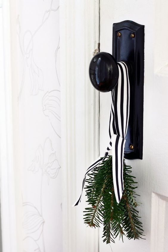 evergreen with black and white striped ribbon