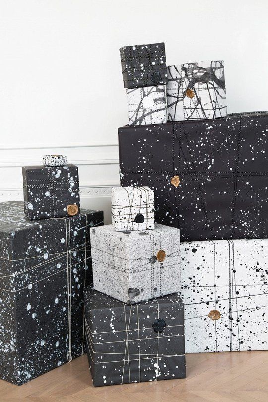 black and white splatter gift wrapping with stamps
