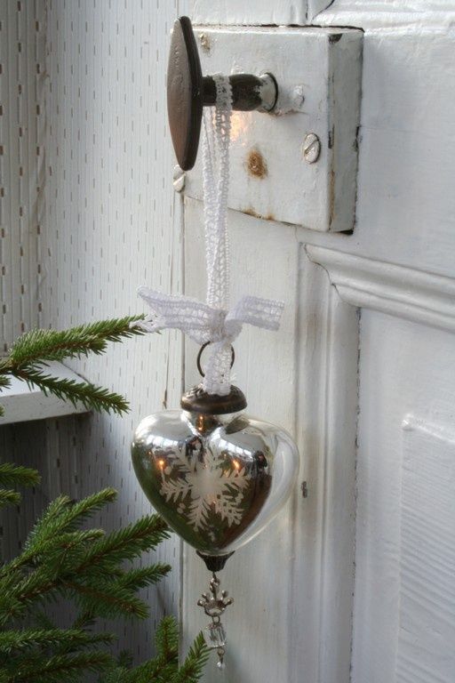 shabby chic heart-shaped ornament with a snowflake