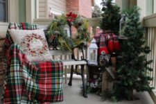 28 a couple of fir trees, a messy wreath and plaid fabric