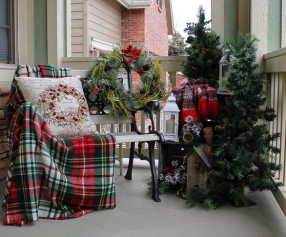 a couple of fir trees, a messy wreath and plaid fabric