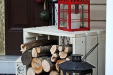 30 a firewood stand and a couple of lanterns