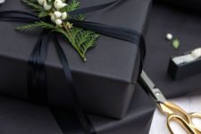 30 charcoal grey wrapping paper, black ribbon and fresh greenery