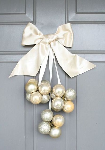 silver, pearl and gold ornaments and a large ribbon bow