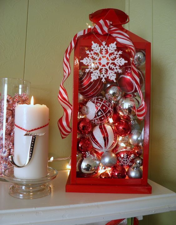 33 spray paint a lantern in red and fill with ornaments in red and white