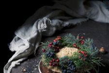 33 traditional Christmas cake withevergreens and berries