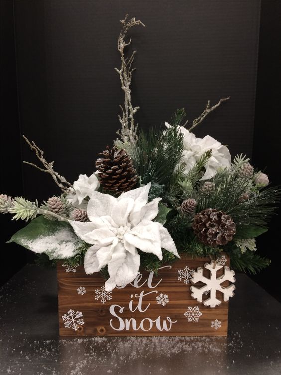 awesome holiday box arrangement with faux evergreens, snowy poinsettia and pinecones