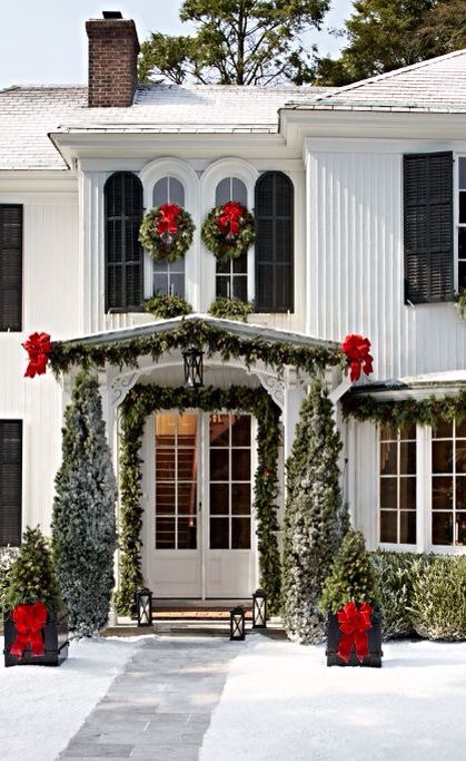 evergreen garland, trees and wreath with red bows