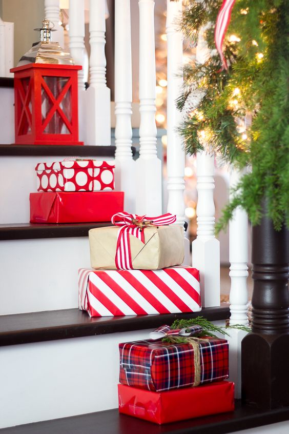 place gift boxes right on the stairs to bring a holiday vibe