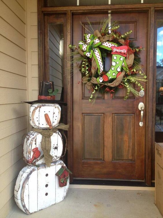 shabby snowman decoration made of reclaimed wood