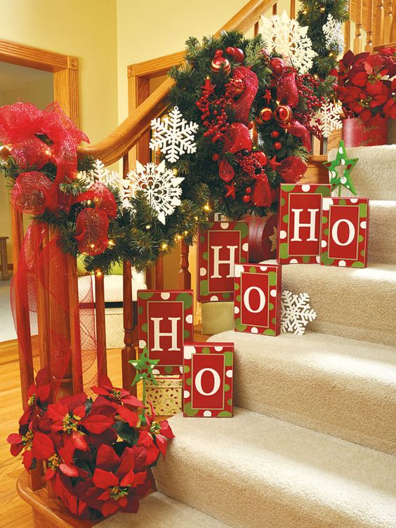 a bold garland and boxes placed right on the stairs